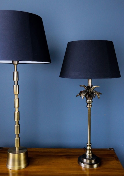 Colonial charm thanks to brushed brass metal accents. Both by Atelier Lumina.