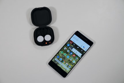 Flip the case open and the Pixel Buds pair automatically