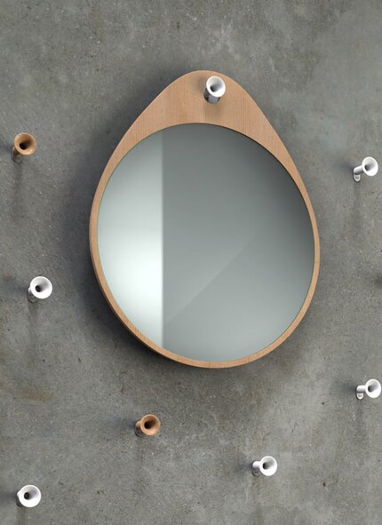 Derière ce miroir se cache un espace de rangement pratique. Image: Rizz
