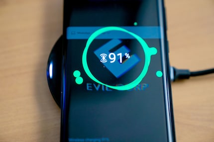 If you have aligned your phone correctly, an LED will light up