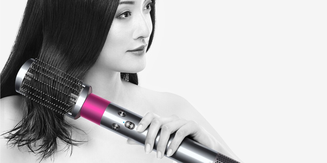The Dyson Airwrap combines a strong stream of air with heat control and the Coandă effect – simultaneously styling and drying your hair. Image source: Dyson