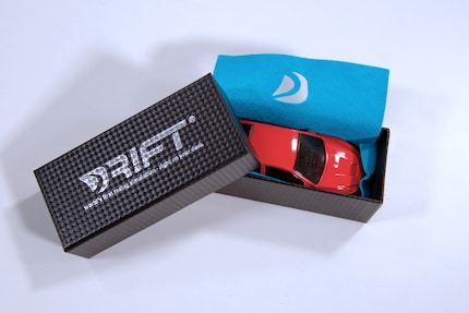 The car in its harmonica box