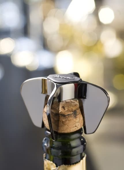 A quick turn opens any sparkling wine bottle. Image: Le Creuset