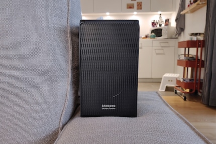 A loudspeaker broadcasts towards the viewer.