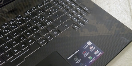 One side camouflage, the other carbon.