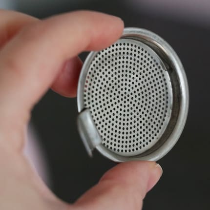 The sieve at the front of the spout is easily removable.