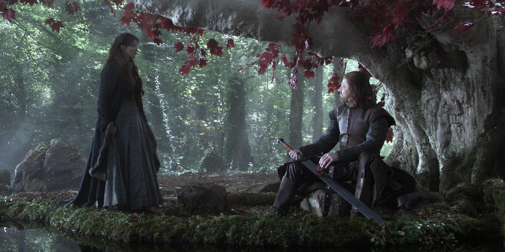 Starks, descendants of the First Men, seen here sharpening their sword under a weirwood.