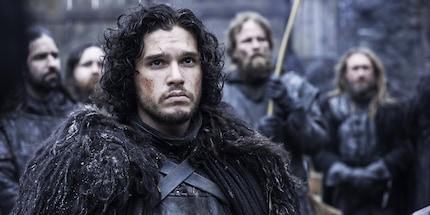 Jon Snow puts on the black.