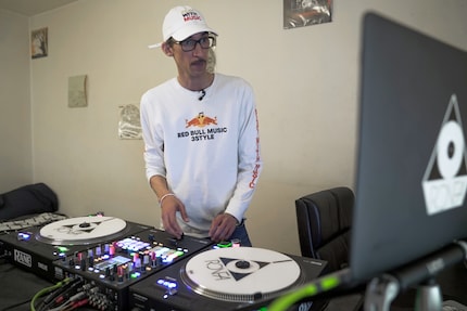In the background: his role models' records.