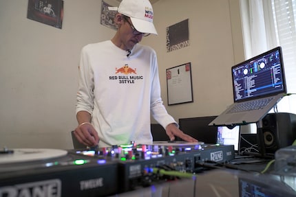 The DJ behind his turntables