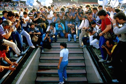 From the very bottom to the very top: Diego arrives in Napoli in 1984 - and is welcomed by 85,000 Tifosi at the Stadio San Paolo.