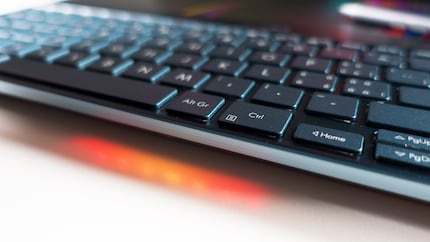 The LED light shows that the ZenBook is currently charging.