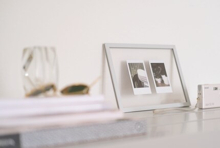 In a transparent frame, photos appear to float.