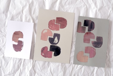 The same image can look different simply due to the colour of the paper.