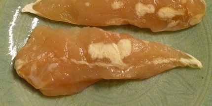 Freezer burn: the white spots on the chicken are pretty obvious. Image source: Wikipedia