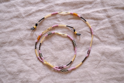 Rows of beads strung with wire rope retain their shape.