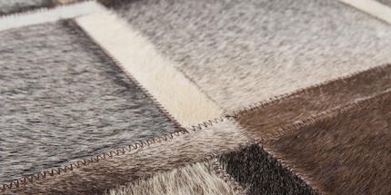 Leder ist ein eher exklusives, aber auch heikles Teppichmaterial.