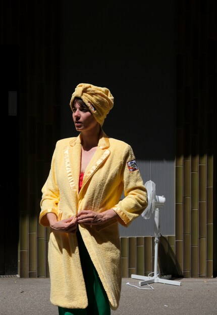 The bathrobe becomes a bathing blazer.