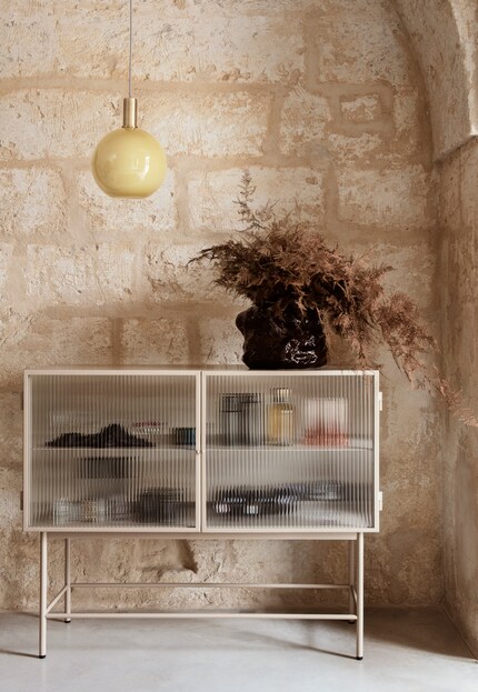 Dishes in shimmering colours add pizzazz. Photo: Ferm Living
