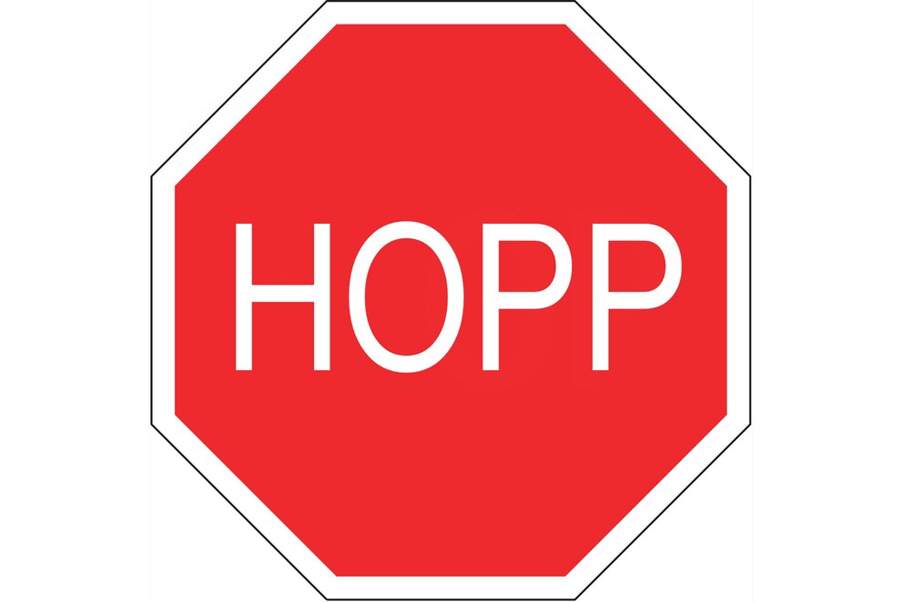 Stopp-Schild aus Sicht eines Velokuriers.