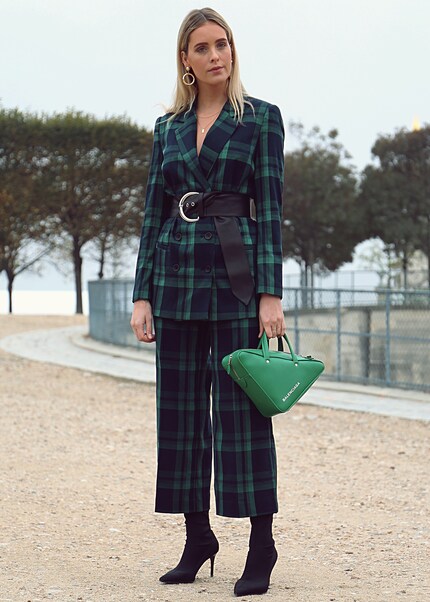 So that a checked suit doesn't come across as staid, style it with modern accessories.