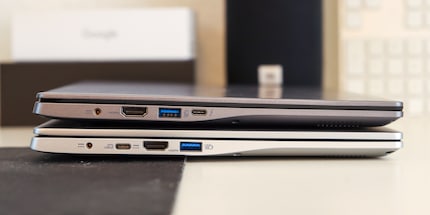 Sul lato sinistro, le porte cambiano posto e solo la versione Intel ha Thunderbolt.