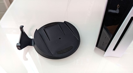Without this stand, the console is wobbly when laid flat.