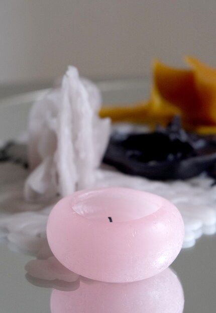 The flame remains undisturbed in the cavity.