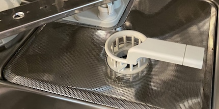 Under the grey ring with a handle lies my dishwasher’s filter.