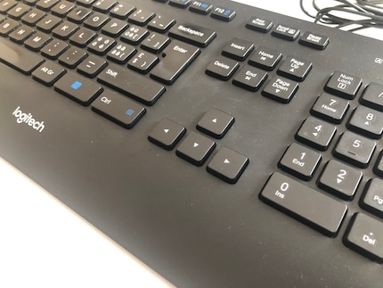 Free space around the arrow keys and their buddies: the layout of a Logitech keyboard.