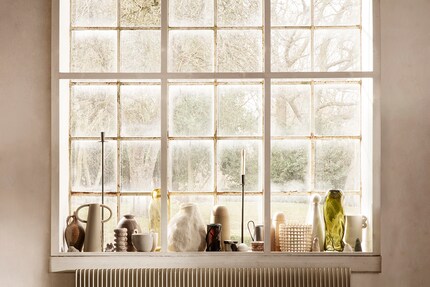 Differently shaped decorative objects harmonise with each other, as long as some colours are toned down. Image: Ferm Living