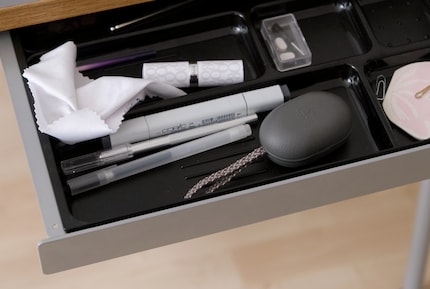 Removable compartments for the drawer make tidying up easy.