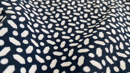Close-up of polyester swim trunks.
