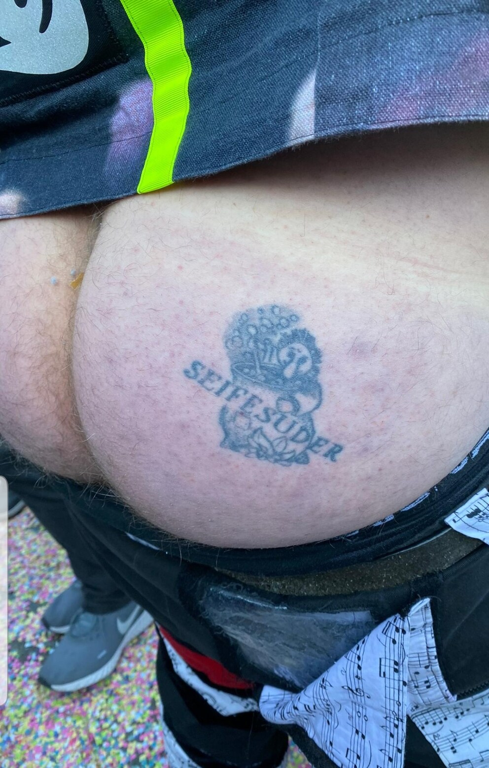 Many find carnival a pain in the butt. Others have the name of their marching band (Gugge) tattooed on it.