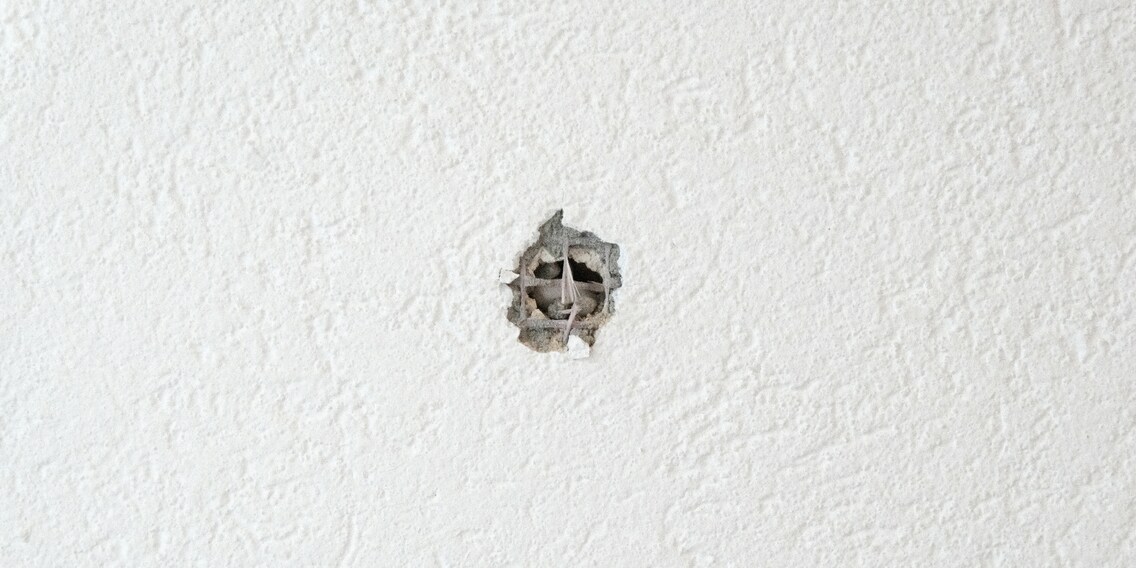 My neighbour has drilled through my wall. Now what?