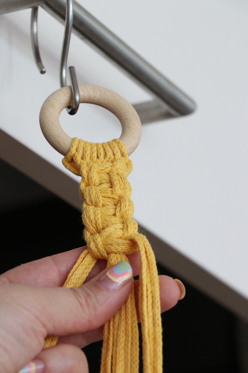 Then slide the knot up and tighten it.