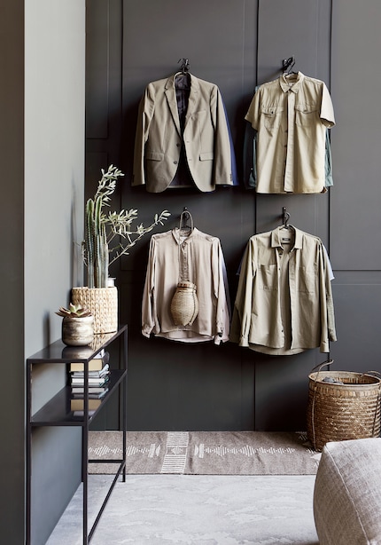 These light-coloured garments really come into their own when contrasted with a dark-coloured wall.