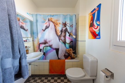 The fateful scene occurred behind this curtain, in the tub.