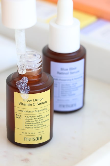 Meisani's Glow Drops Vitamin C Serum contains white beads of vitamin C that dissolve upon application.