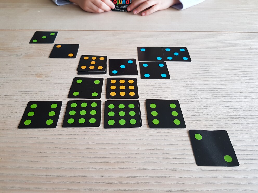 I’m about to tell my daughter to put a blue card on the right next to my green so I can’t finish my row.