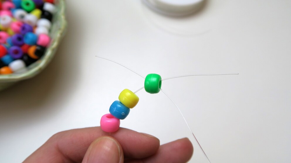 Mit der X-Methode werden aus vier Perlen…