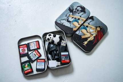 A candy box is the perfect size to store bits and bobs. I had mine printed with pictures I painted myself.