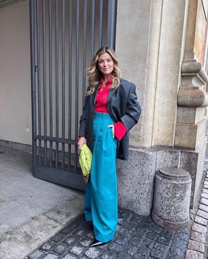Red combined with cyan and dark grey - plus a neon green splash of colour.