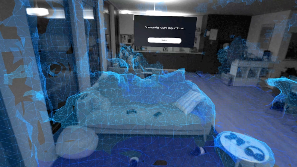 Ecco come il visore VR vede il divano e il resto del soggiorno. Più poligoni blu sono visibili durante la scansione, meglio è.