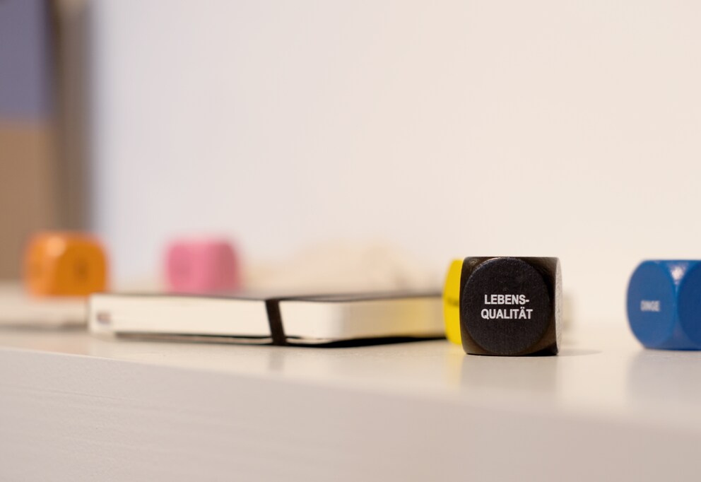 The dice game aims to help people deal with unpleasant topics in a playful way.