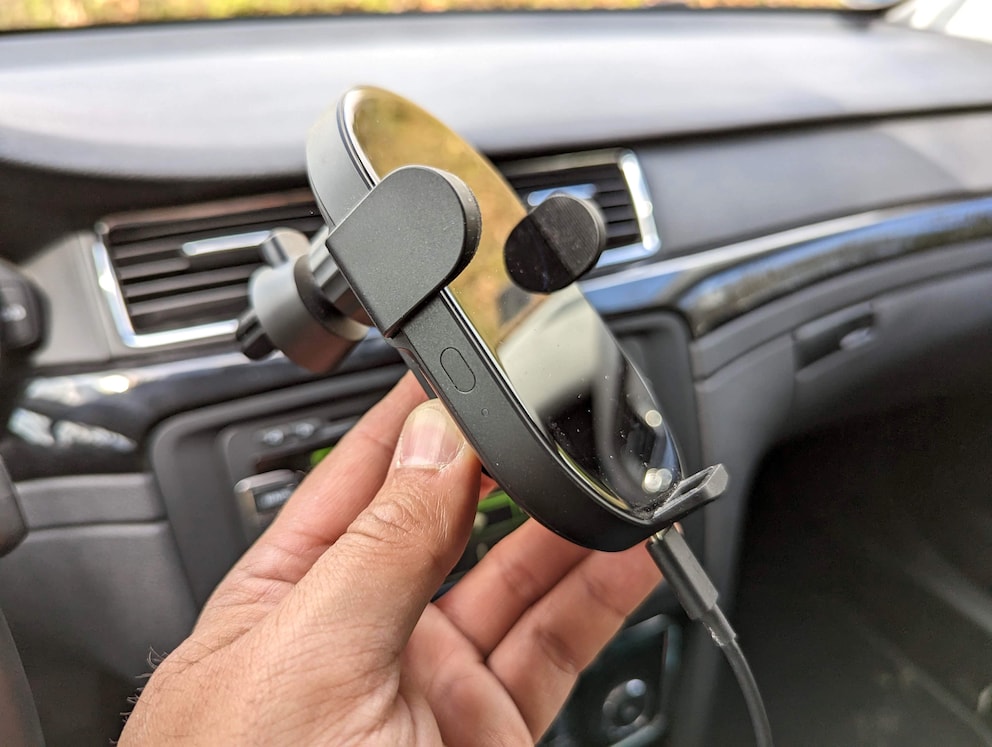 Xiaomi’s holder charges wirelessly and opens automatically.