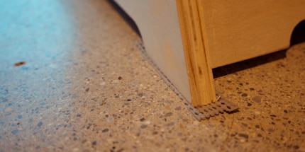 A small hack helps keep the frame that the wheel stands on in one place, even on a slippery floor.