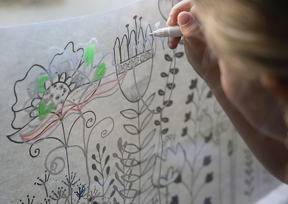 The third and final try: my older daughter puts the white pen to work.