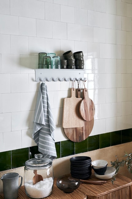 Keep your kitchen countertop uncluttered with the Coat Rack.