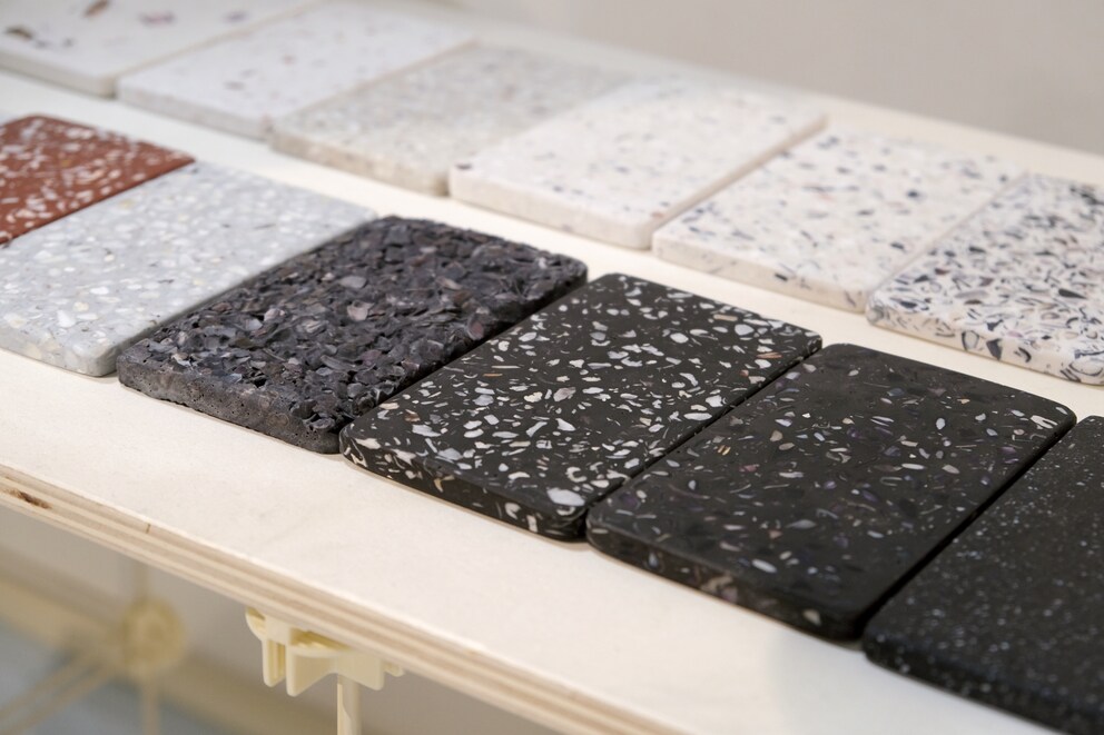 The terrazzo-like material contains crushed shells of oysters, scallops and abalone. It can also be smoothed.